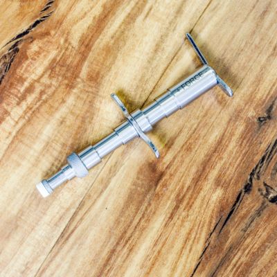 The Integrator chiropractic adjusting instrument used for Torque Release Technique adjustments at The Wellness Path neuro-focused chiropractic clinic in Knoxville TN