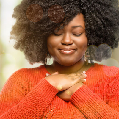 Woman taking a deep, relieved breath after nasal release technique treatment at The Wellness Path in Knoxville TN — relief from sinus pressure, brain fog, and cranial compression