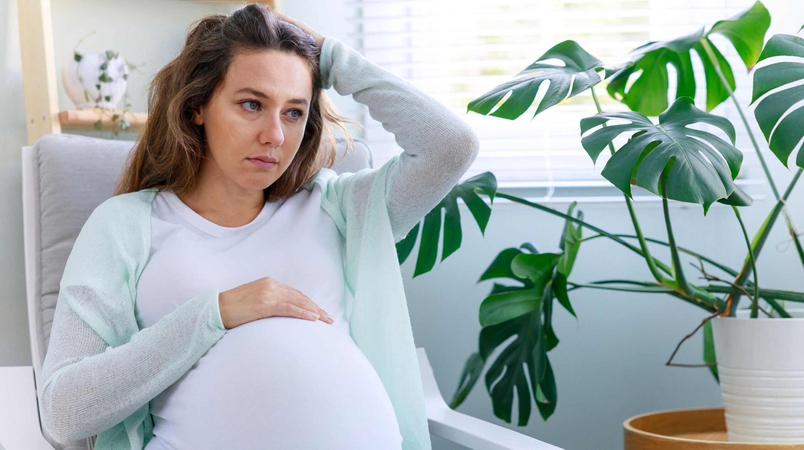 Pregnant woman receiving safe chiropractic care for headaches at The Wellness Path in Knoxville TN