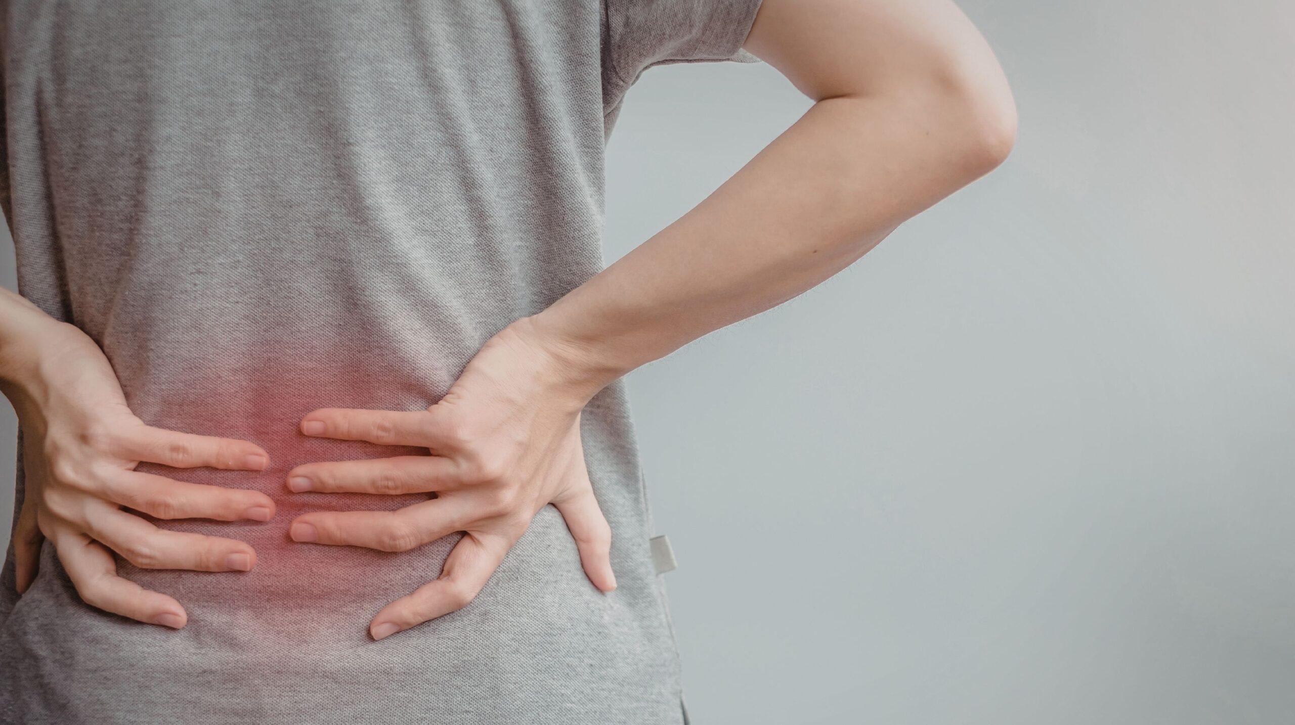 Person receiving chiropractic care for herniated disc at The Wellness Path in Knoxville TN
