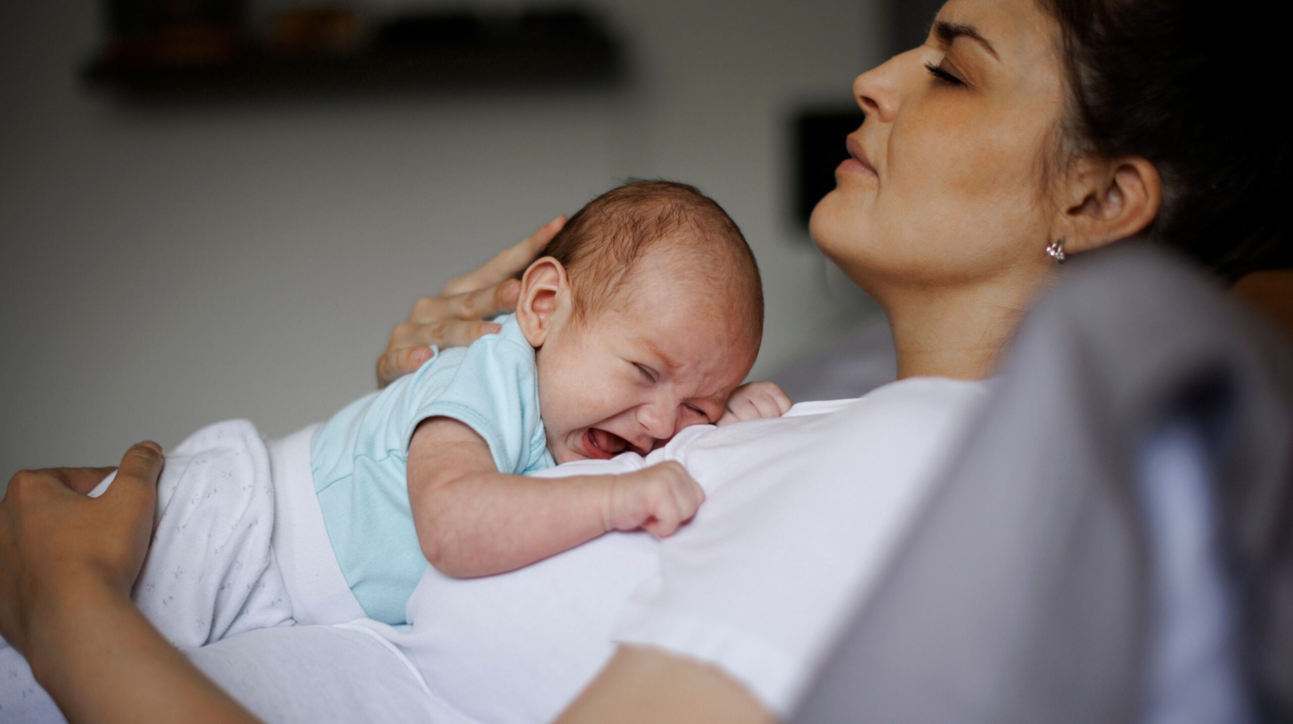 Infant receiving gentle chiropractic care for reflux and gas at The Wellness Path in Knoxville TN