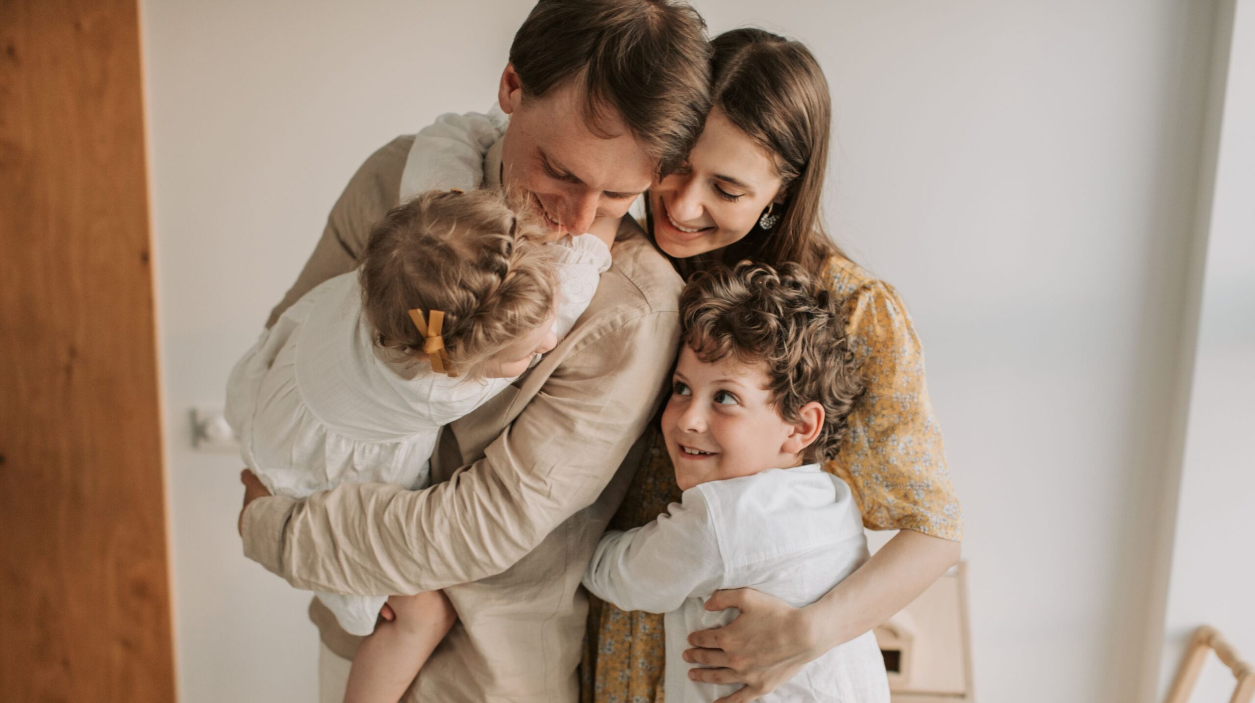 Couple with baby receiving neuro-focused chiropractic care at The Wellness Path in Knoxville TN