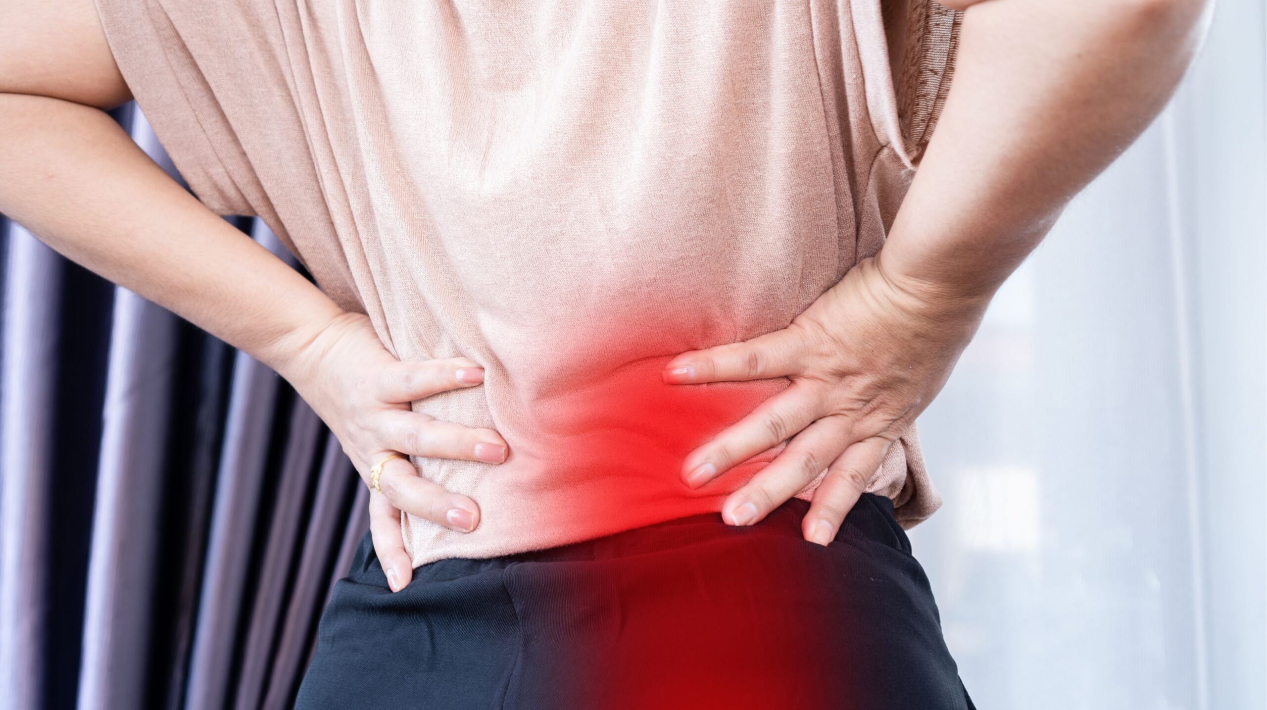 Person receiving chiropractic care for sciatica at The Wellness Path in Knoxville TN