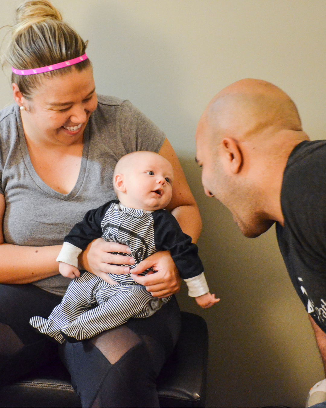 Chiropractor in Maryville TN Dr. Vic Manzo consulting with a child and mother at The Wellness Path